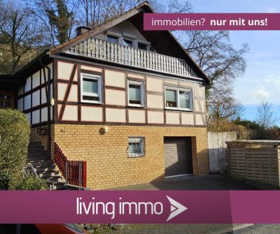 Zentrales Wohnglück: Vielseitiges Einfamilienhaus mit Balkon und Terrasse & klarem Konzept