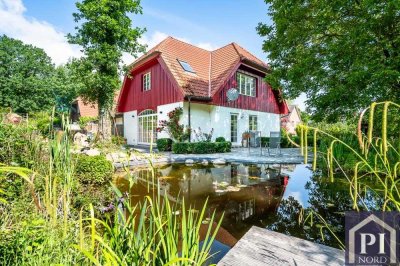 Architektonisch anspruchsvolles Wohnkonzept mit Gartenparadies und unmittelbarer Waldrandlage