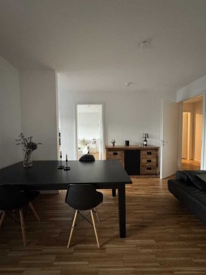 Helle Neubauwohnung mit Balkon & TG