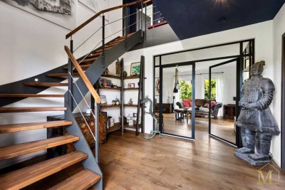 Ein architektonisches Statement:
Wenn Stahl, Glas und Holz sich perfekt vereinen.