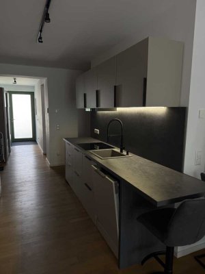 Moderne 2-Zimmer-Neubauwohnung (2024) mit Fußbodenheizung, Loggia, Aufzug und hochwertiger EBK