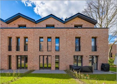 Traumhaftes Stadthaus mit Garten, Dachterassen und zwei Tiefgaragenplätzen