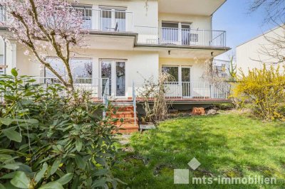 MTS-Immobilien/ Kronberg - Helle Vierzimmerwohnung mit grossem eingewachsenen Garten