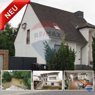 Stadthaus mit zwei Parteien und Ausbaureserve in ruhiger Lage.