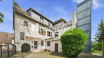 Denkmalgeschütztes Zweifamilienhaus mit Entwicklungspotenzial in Oestrich-Winkel