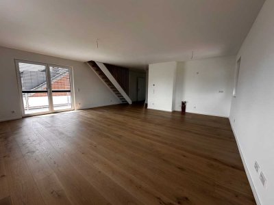 Moderne Neubau-Maisonette mit Sonnenbalkon und KfW-55-Effizienzstandard in Hürth