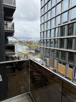 Neubau mit Balkonblick im Zollhafen – Erstbezug mit hochwertiger Küche