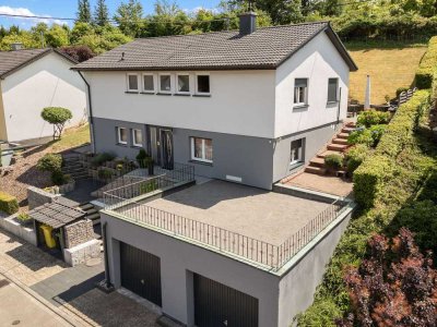Freistehendes Einfamilienhaus im mediterranen Stil mit großem Grundstück in Selbach