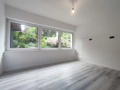 Schöne 3 Zimmer Erdgeschoss Wohnung mit Einbauküche, Kamin und Stellplatz
