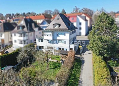 Charmantes Mehrfamilienhaus mit Gewerbeeinheit, zwei Wohnungen & Garten mit Potenzial!