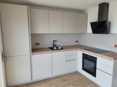 hochwertige 2-Zimmer-Erdgeschosswohnung im Neubau, gehobene Ausstattung mit EBK und Stellplatz