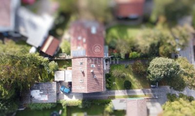 Altbestand auf großem Grundstück für Neubau oder Sanierung – ruhige Lage nahe der Isar