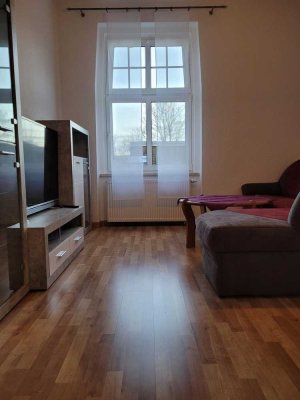 Sonnige voll möbilierte Wohnung mit EBK im Hochparterre