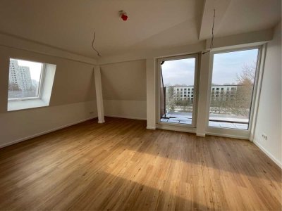Helle 2-Zimmer Neubau-Dachgeschosswohnung mit Balkon