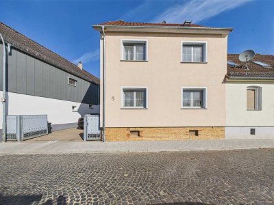 Familienfreundlich und perfekt durchdacht! DHH in beliebter Wohnlage von Erbstadt