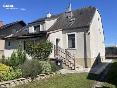 Geräumiges Einfamilienhaus mit traumhaftem Garten und Swimmingpool