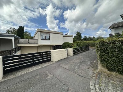 Architect-designed villa with beautiful garden and swimming pool in Rheingau area