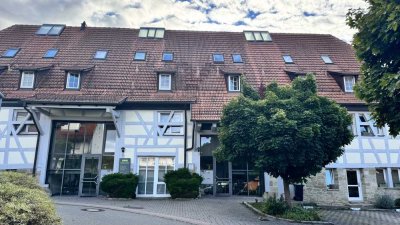 Wohnen mit Geschichte: Stilvolle Wohnung in denkmalgeschützter Zehntscheuer