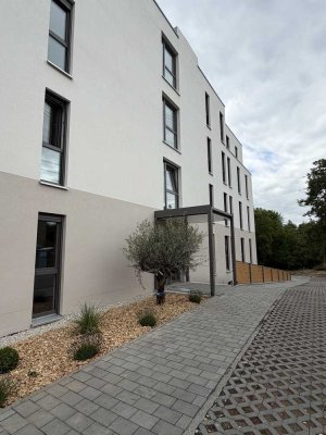Hochmoderne 2-Zimmer Wohnung mit EBK, Terrasse und Gartenanteil