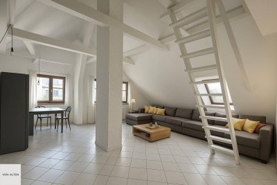 Luftige Dachgeschosswohnung auf einer Ebene mit Loggia