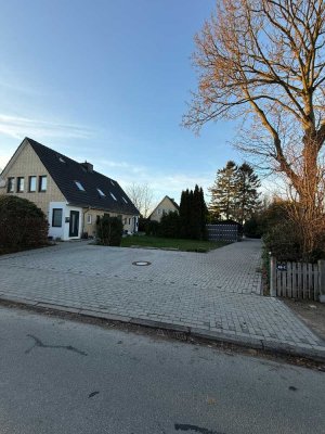 zwei vermietete Doppelhaushälften mit viel Potential