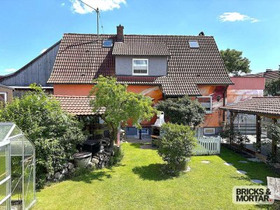 Grünes Wohnglück mit Dachterrasse - Einfamilienhaus mit Kaminofen & Garten