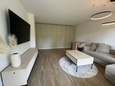 Exklusive, modernisierte 1-Zimmer-Wohnung mit eigenem Garten und Einbauküche in Düsseldorf