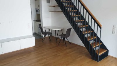 Helle Galerie-Wohnung im Candis mit Balkon