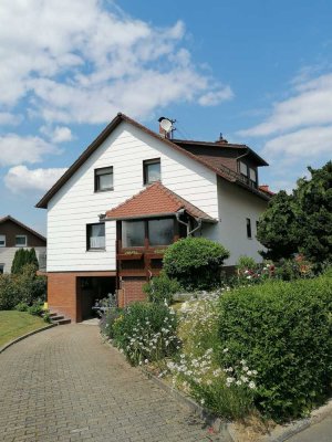 Gepflegtes Zweifamilienhaus mit Garten am Katzenbuckel -
Einziehen und los leben in Oberdielbach