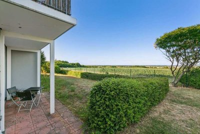 Wohnung mit Hauscharakter– Traumhafter Ausblick und eigener Garten