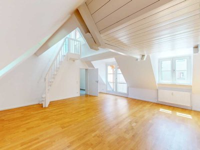 Erster Monat mietfrei: Besondere 3-Zimmer-Maisonettewohnung mit Dachterrasse