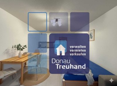 Sonniges 1-Zimmer-Apartment mit West-Terrasse & eigenem Tiefgaragenstellplatz in Uninähe