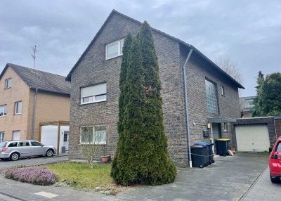 Quadrath-Ichendorf, voll vermietetes Dreifamilienhaus, Erdgeschosswohnung mit Garten, 2 Garagen