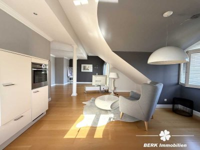 BERK Immobilien – Stilvolle DG-Wohnung mit großer Dachterrasse und Weitblick auf der Schweinheimer H