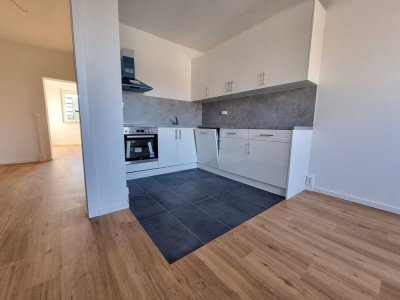 Erdgeschosswohnung mit Balkon und Einbauküche