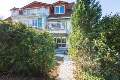 Stilvolle Maisonette im Erdgeschoss: Zwei Ebenen, sonnige Terrasse, Souterrain & Gartenidylle