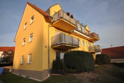 Dachgeschosswohnung mit Fußbodenheizung, Balkon und PKW Stellplatz