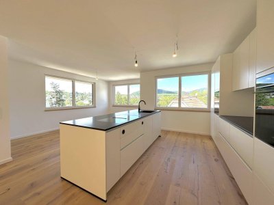 Erstbezug: Gartenwohnung mit Hausflair – Stellplatz mit E-Ladestation-Vorbereitung &amp; großzügiger Panoramaterrasse