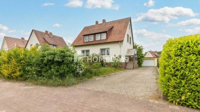 Charmantes Einfamilienhaus mit großem Garten, Wintergarten und Garagen auf Erbpachtgrundstück