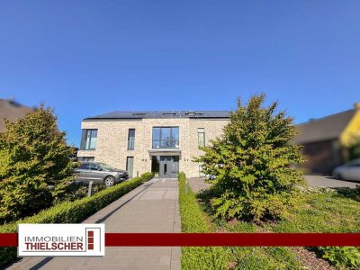 Moderne Zwei-Zimmer-Wohnung im KfW-40-Plus-Haus mit Balkon und Stellplatz in Heinsberg-Karken