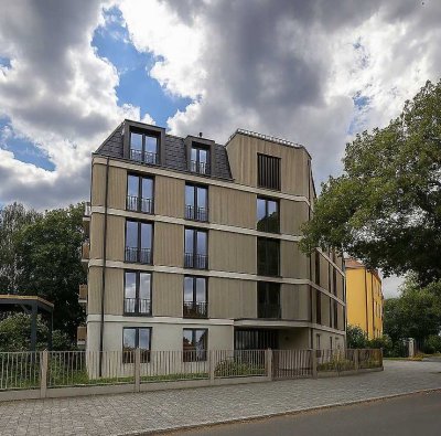 Stilvolle Eleganz im Erdgeschoss – lichtdurchflutete 2-Raumwohnung mit privater Terrasse