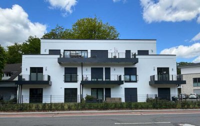 Großzügige Neubauwohnung mit Terrasse und Gartenanteil