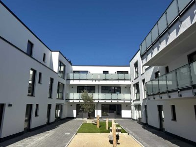 FRIEDERICH: Erstbezug - Eigentumswohnung im 1. Obergeschoss mit Balkon und Einbauküche