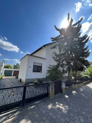 Gepflegte Eigentumswohnung mit 2 in sich abgeschlossenen Wohneinheiten + Gartenanteil im 2 Fam.Haus