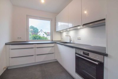 EG-Wohnung mit Terrasse, kleinem Garten und EBK