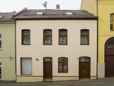 Gemütliches Stadtleben: Verkauf eines kleinen Reihenmittelhauses in Oelsnitz im Vogtland