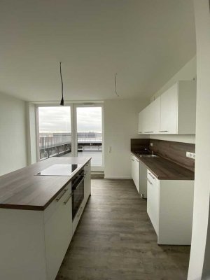 Wohnen im Neubau mit großzügiger Dachterrasse