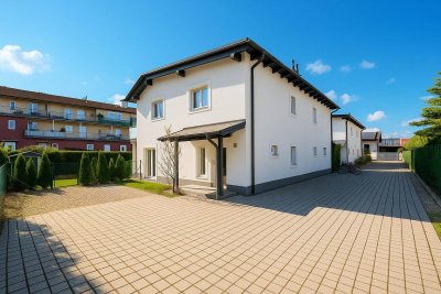 Neuwertige Doppelhaushälfte in sonniger Lage mit Mieter für Anleger