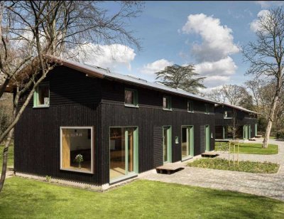 Moderne Doppelhaushälfte mit großem  Garten und Wasserzugang auf dem  denkmalgeschützten Wümmehof