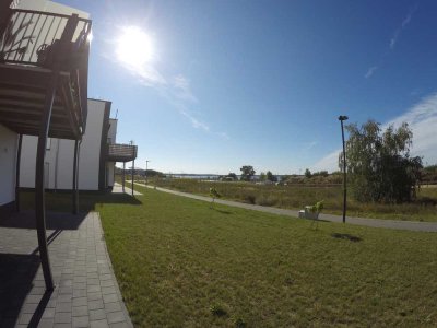 Wohnen am See - Neuwertige 4-Raum-EG-Wohnung mit geh. Innenausstattung mit Terrasse und EBK